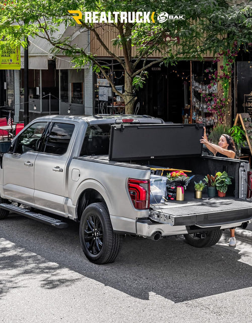 Load image into Gallery viewer, BAK Bakflip MX4 Hard Folding Truck Bed Tonneau Cover | 448339 | Fits 2021-2022 Ford F-150 5' 7" Bed (67.1")
